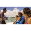 Dive professional briefing students aboard a boat — official PADI Divemaster course photograph
