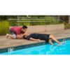 Student practising poolside rescue breathing — official PADI Emergency First Response Primary and Secondary Care course photograph
