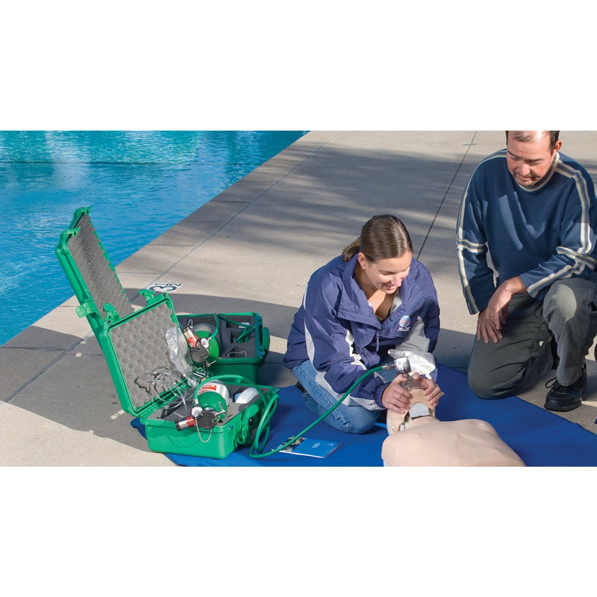 Diver training on a CPR dummy — official PADI Emergency Oxygen Provider course image