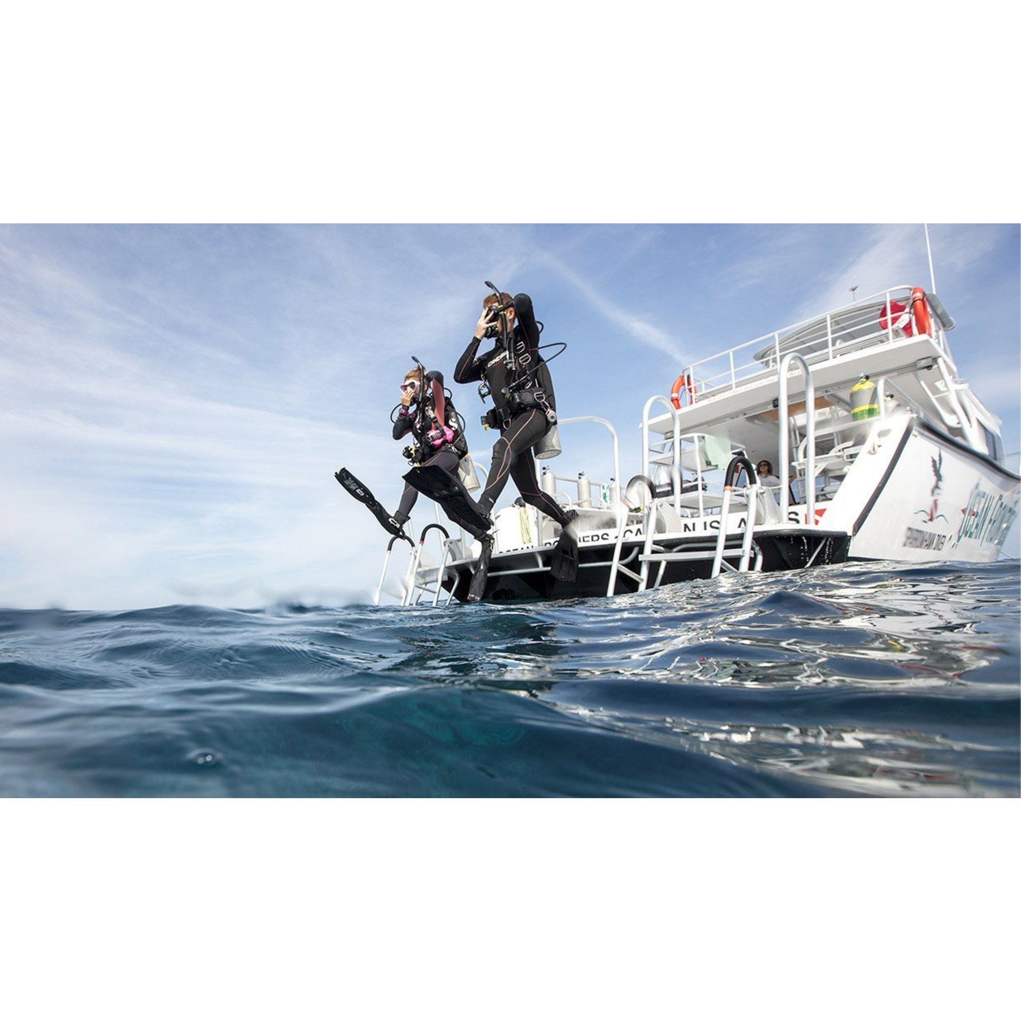 Two divers doing a giant stride — official PADI ReActivate Scuba Refresher Program course image